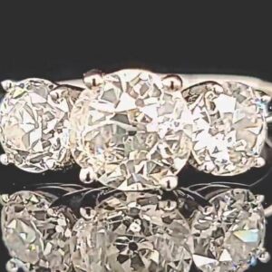 2.85ct. Platinum Vintage three stone engagement ring Round old mine cut Diamond SI1